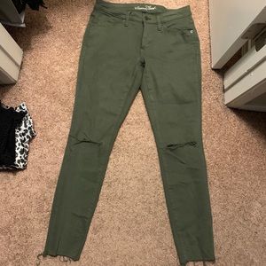 Army green skinny jeans